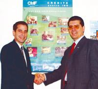 Semnarea acordului intre PMI Romania Chapter si CHF International Romania pe 5 decembrie 2005